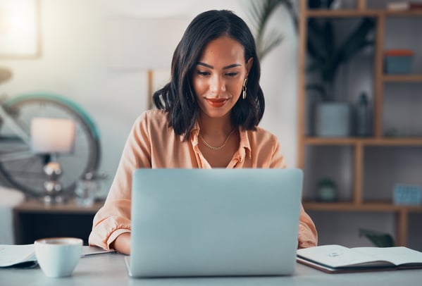 Woman learning on laptop
